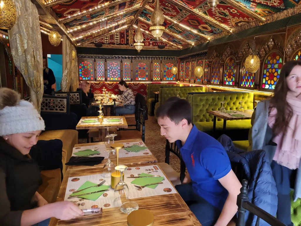 family eating at Bab Monsour in Granada, Spain