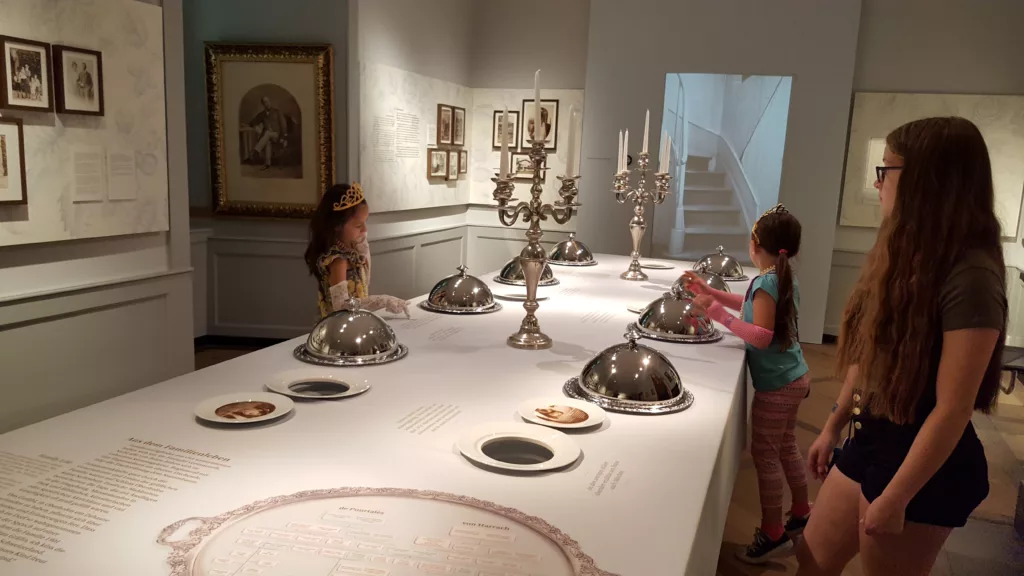 Kids activity around a royal table with food at Oberhofen Castle in Switzerland