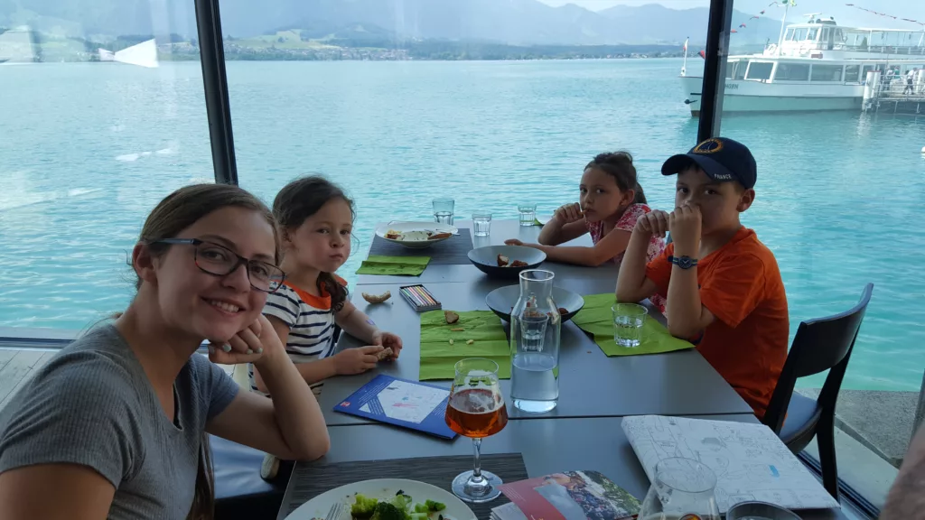 Family eating inside Restaurant Schloss Oberhofen (castle restaurant)