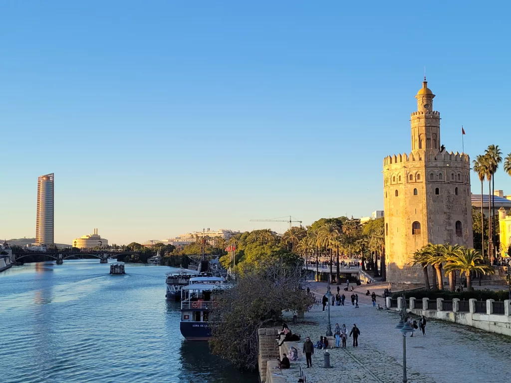 Photo showing Torre del Oro in foreground and Torre Seville in background