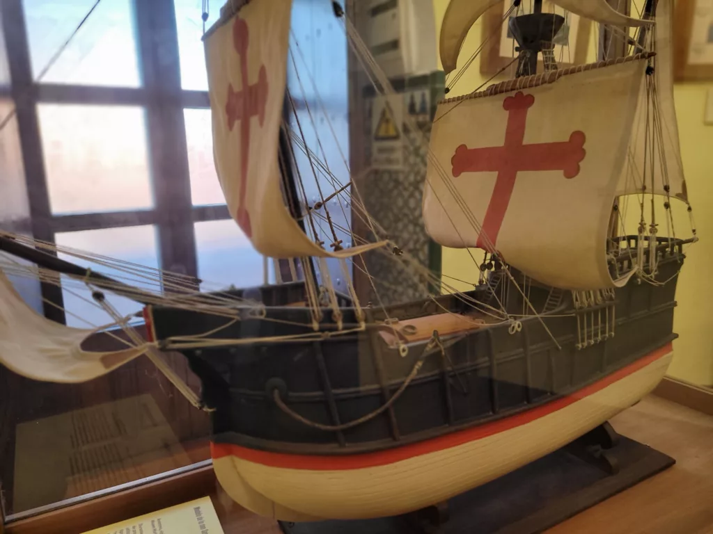 Photo of a model ship inside Torre del Oro naval museum