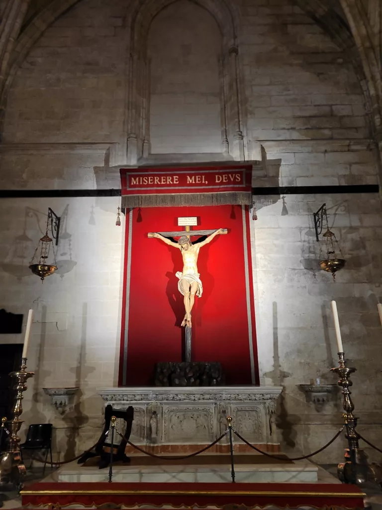 Photo of a Catholic relic depicting Jesus on the cross inside Seville Cathedral