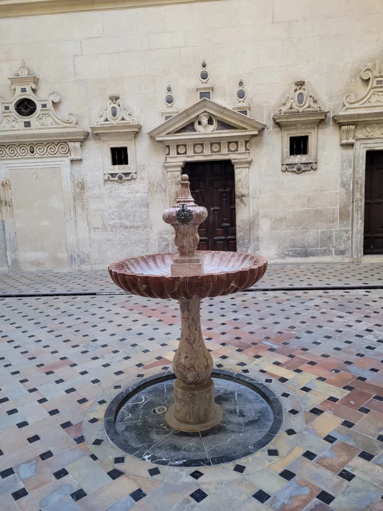 Fountain in a courtyard located inside Seville Cathedral. Is of Moorish style.