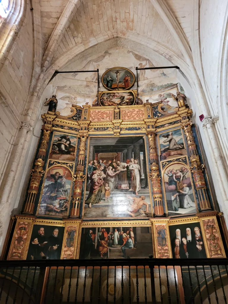 Photo of a large painted memorial inside the Seville Cathedral