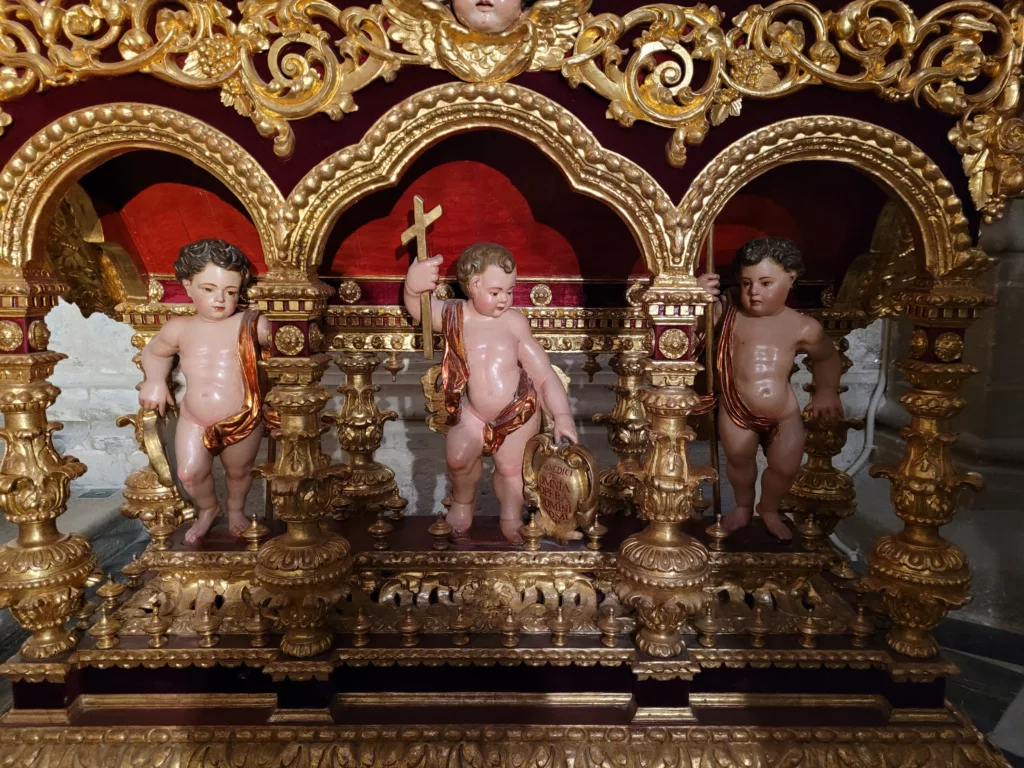 Three cherub status inside the Seville Cathedral