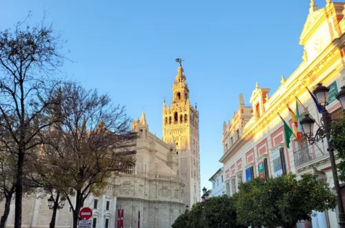 Photo of Seville Cathedral and Giralda Tower at sunset