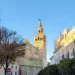 Photo of Seville Cathedral and Giralda Tower at sunset