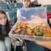 child at airport looking in amazement at snackle box